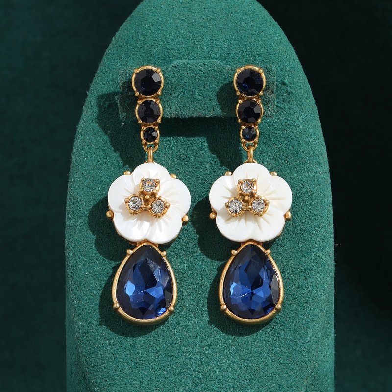 Vintage Fashion Jewelry Brands - Boucles d'oreilles Vintage en cristal blanc
